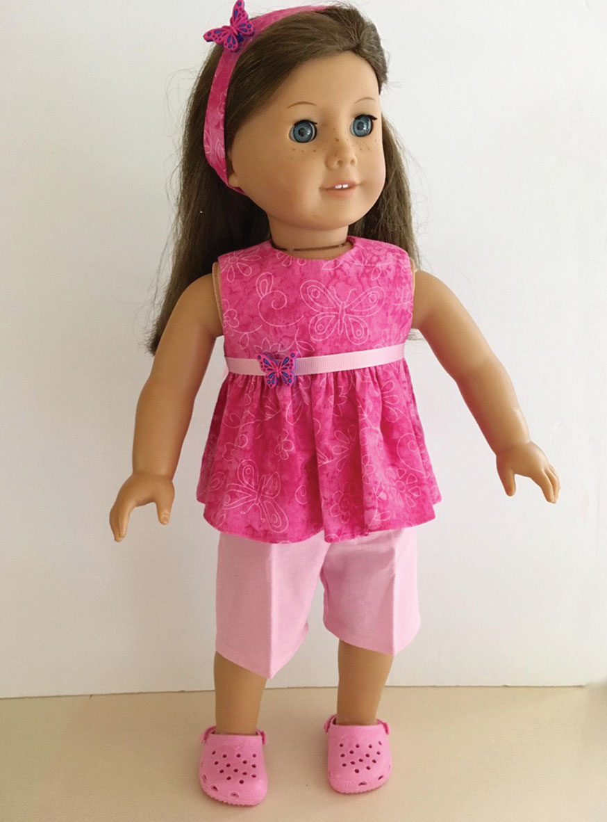 Pretty pink shorts outfit with pink crocs and matching headband | Dolly ...